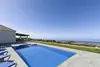 Villa Claudia, swimming pool and view of the Caldera